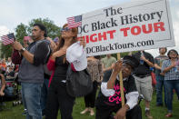 <p>Don Folden of Washington, DC takes a knee as pro-Trump supporters stand during the national anthem on the National mall on September 16, 2017 in Washington. Organizers are calling the rally in support of President Donald Trump “The Mother of All Rallies”, President Trump is in New Jersey ahead of attending the U.N. General Assembly next week. (Photo: Tasos Katopodis/Getty Images) </p>