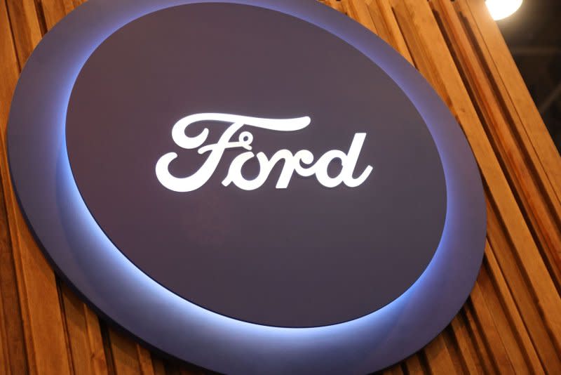 A view of a lighted Ford Motor Company sign on display during the 2023 SEMA Show, at the Las Vegas Convention center, Nov. 2023. On Monday, Ford said the car company is “working with NHTSA to support its investigation.” File photo by James Atoa/UPI