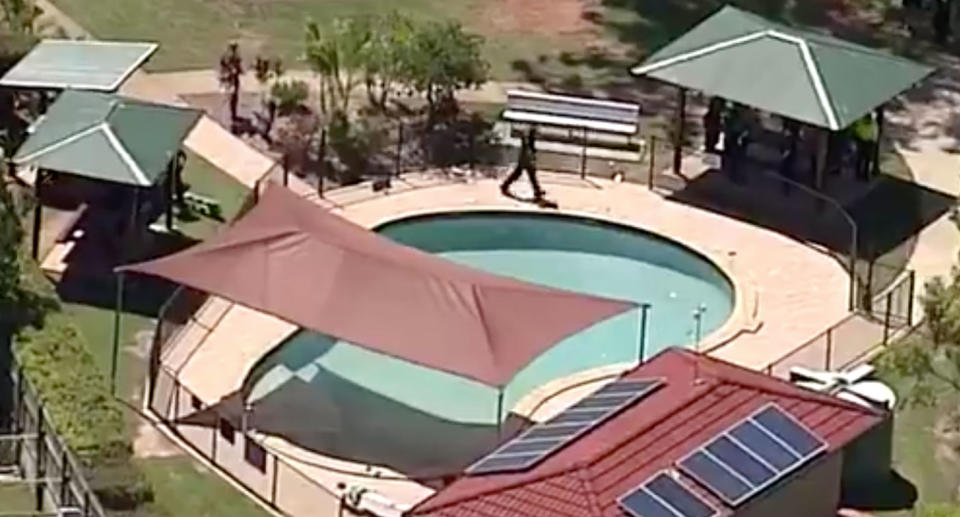 A woman in her 30s and an 11-year-old boy were found unconscious in the pool of a gated community in Brendale on Thursday. Source: 7 News