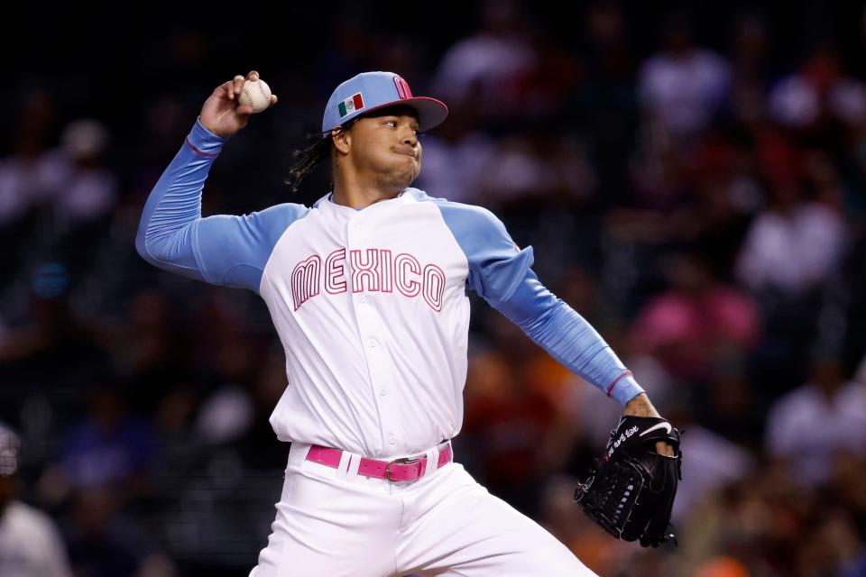 Starting pitcher Taijuan Walker #99 of Team Mexico pitches against Team Great Britain during the first inning of the World Baseball Classic Pool C game at Chase Field on March 14, 2023, in Phoenix, Arizona.