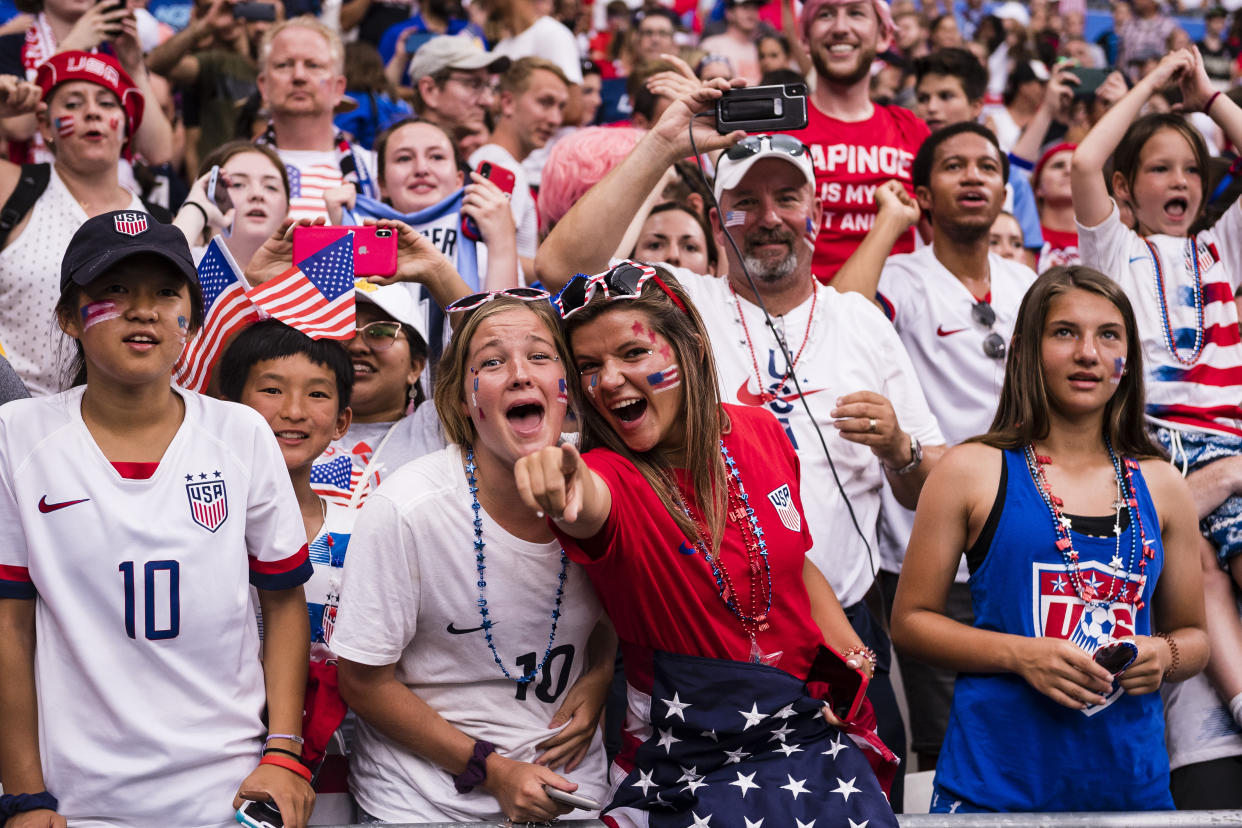 LYON, FRANCE - JULY 07: USA fans celebrating after winning Netherlands during the 2019 FIFA Women's World Cup France Final match between The United State of America and The Netherlands at Stade de Lyon on July 7, 2019 in Lyon, France. (Photo by Marcio Machado/Getty Images)