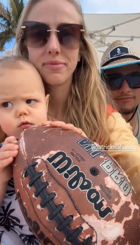 <p>Brittany Mahomes/Instagram</p> Patrick Mahomes rocks a Chileno Bay hat while posing with wife Brittany and son Bronze.