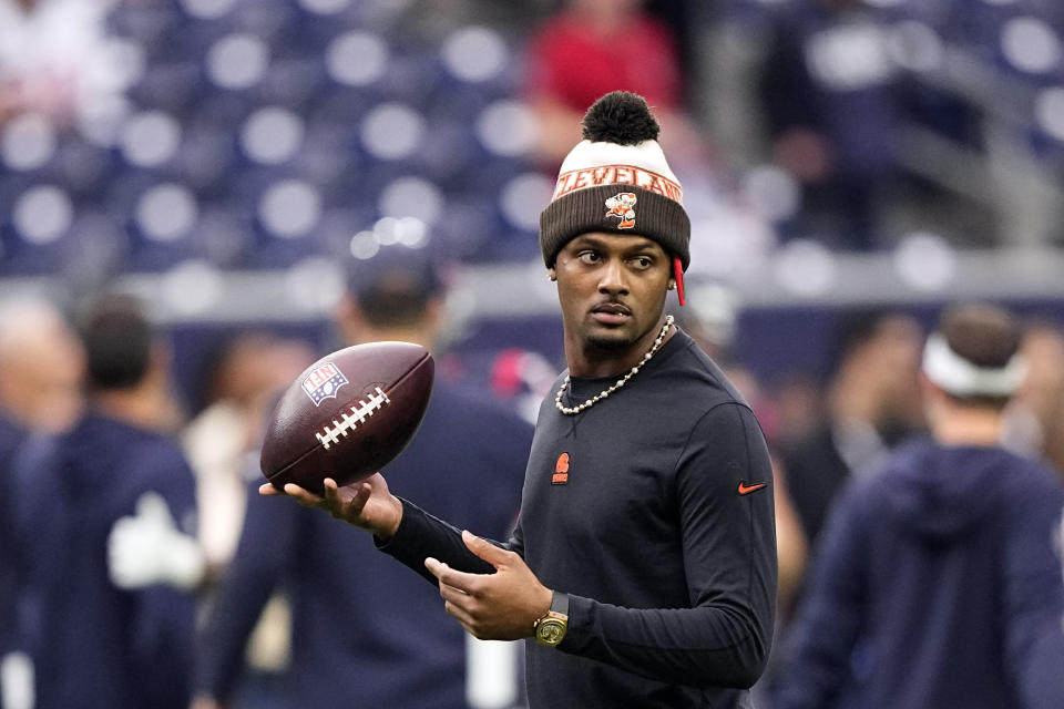 FILE - Cleveland Browns quarterback Deshaun Watson watches teammates warm up before an NFL football game against the Houston Texans, Jan. 13, 2024, in Houston. Browns coach Kevin Stefanski said Sunday, Jan.14, 2023, that he’s confident Watson will bounce back from a season-ending injury and play at a high level going forward. Watson was limited to five starts in his second season with Cleveland. (AP Photo/David J. Phillip, File)