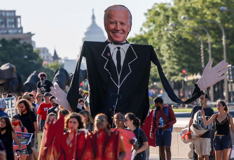 FILE PHOTO: Environmental activists protest outside the White House in Washington, U.S.