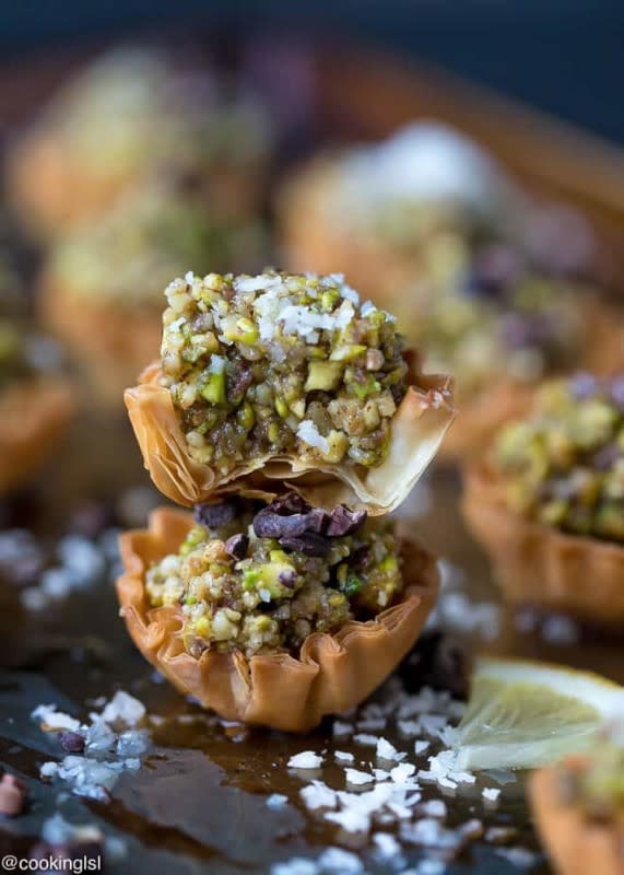 <p>Cooking LSL</p><p>These mini phyllo baklava cups are flakey, sweet and delicious, these mini bites are great for a party or celebration. A mini version of a popular Middle Eastern dessert.</p><p><strong>Get the recipe: <a href="https://cookinglsl.com/mini-phyllo-baklava-cups-recipe/" rel="nofollow noopener" target="_blank" data-ylk="slk:Mini Phyllo Baklava Cups;elm:context_link;itc:0;sec:content-canvas" class="link rapid-noclick-resp"><em>Mini Phyllo Baklava Cups</em></a></strong></p>