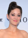 Was there ever even a competition? Cotillard's effortless beauty and essential "French-ness" is the perfect counterpoint to this curvaceous updo. Use a strong hold hairspray with shine to achieve this sleek look. photo credit: George Pimentel
