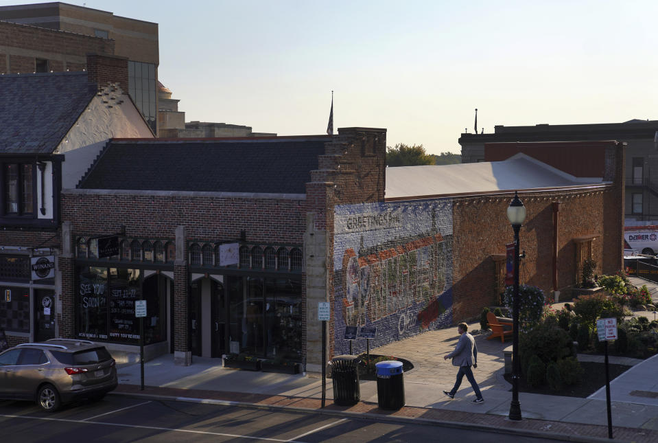 A man walks through Downtown Springfield, Ohio, Monday, Sept. 16, 2024. (AP Photo/Jessie Wardarski)