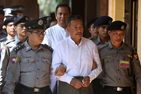 Kyi Lin and Aung Win Zaw, who are accused of the murder of Muslim lawyer Ko Ni, arrive at Insein court in Yangon, Myanmar February 15, 2019. REUTERS/Ann Wang