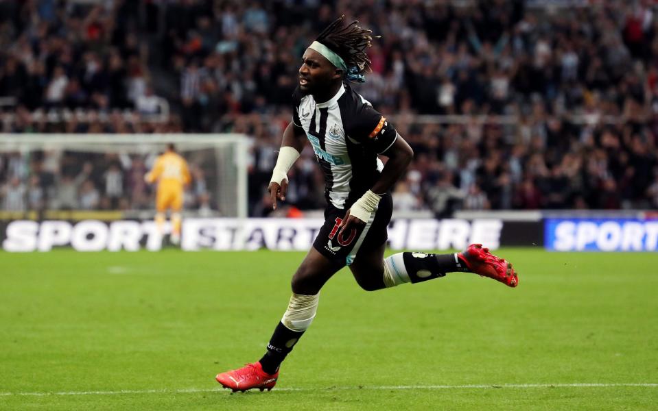 Allan Saint-Maximin of Newcastle United celebrates after scoring their team's first goal during the Premier League match between Newcastle United and Leeds United at St. James Park - Ian MacNicol/Getty Images