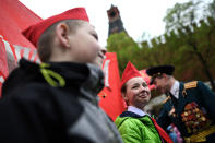 <p>Children take part in a ceremony initiating them into the Young Pioneer Youth communist group in Moscow’s Red Square, May 21, 2017. (Photo: Kirill Kudryavtsev/AFP/Getty Images) </p>