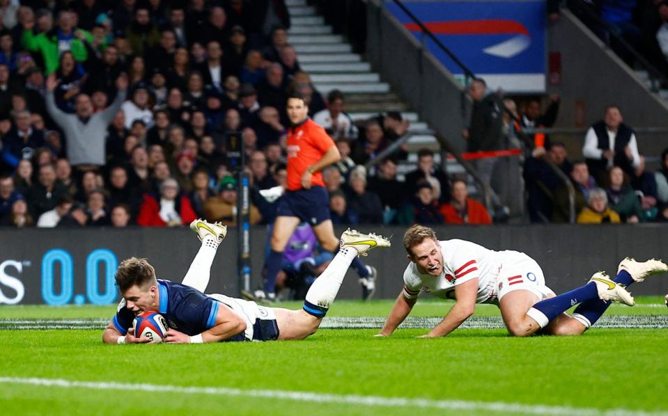 Huw Jones scoring a try at Twickenham - No England players make our Six Nations team of the tournament - Reuters/Peter Nicholls