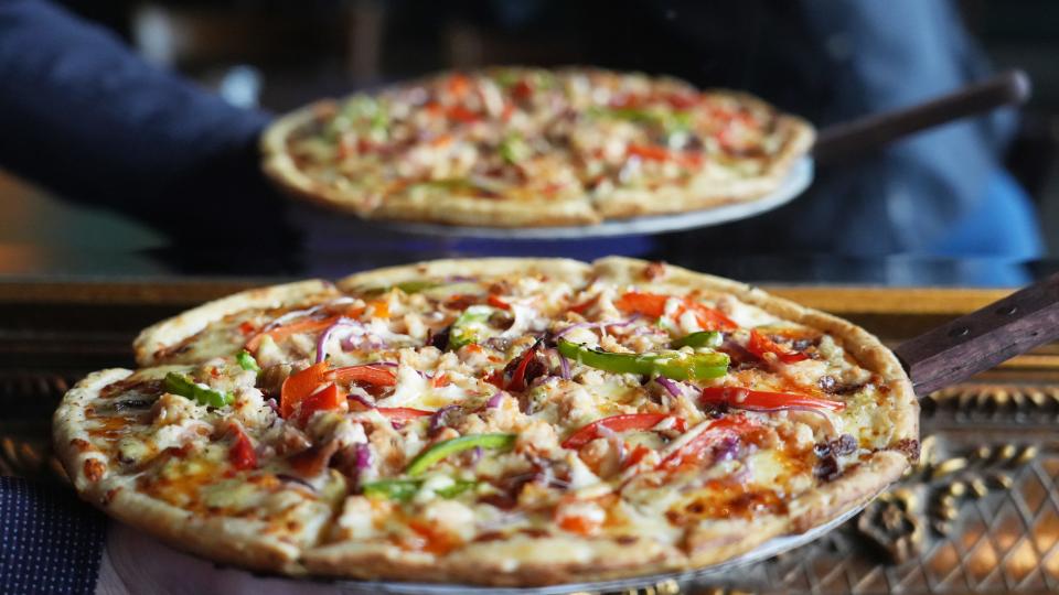 A chicken-bacon-ranch pizza created by general manager Chris Burdulis. It has a five-cheese blend, Alfredo sauce, bacon, red onion, grilled chicken, bell peppers, jalapeno ranch and sweet chile sauce.