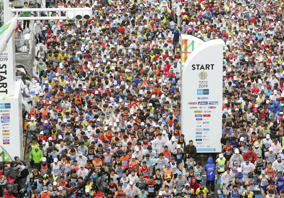 Athletics - Tokyo Marathon 2019 - Tokyo, Japan - 03/03/19 - Runners at the start of the Tokyo Marathon 2019, in this photo taken by Kyodo. Mandatory credit Kyodo via REUTERS ATTENTION EDITORS - THIS IMAGE WAS PROVIDED BY A THIRD PARTY. MANDATORY CREDIT. JAPAN OUT. NO COMMERCIAL OR EDITORIAL SALES IN JAPAN. THIS IMAGE WAS PROCESSED BY REUTERS TO ENHANCE QUALITY, AN UNPROCESSED VERSION HAS BEEN PROVIDED SEPARATELY.