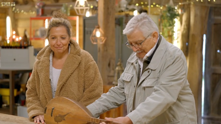 One man took in an instrument called a saz. (BBC screengrab)