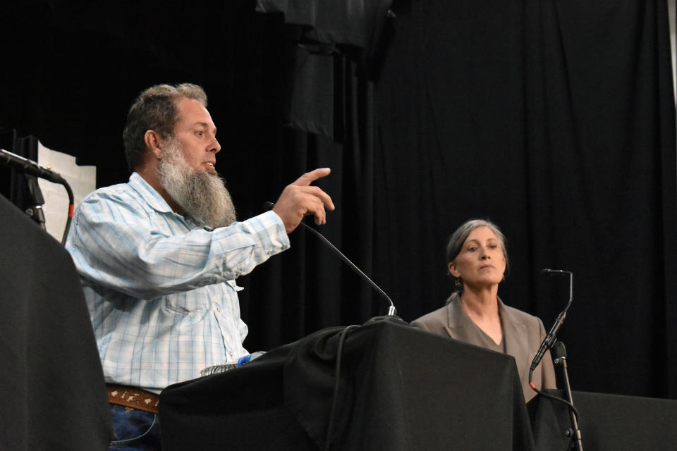 Libertarian U.S. House candidate John Lamb speaks during a debate against Democrat Monica Tranel, right, and Republican Ryan Zinke at Montana Technological University, in Butte, Mont., Thursday, Sept. 29. 2022. Lamb has toured the state with Tranel attending Democratic-sponsored debates. They've differed sharply on issues but united in criticizing Zinke. (AP Photo/Matthew Brown)