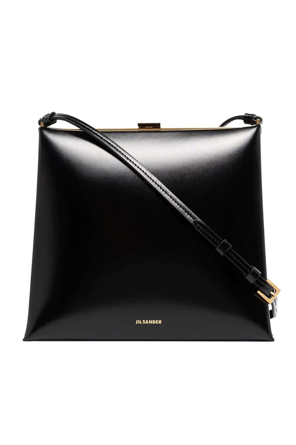 <p><a class="link " href="https://www.farfetch.com/uk/shopping/women/jil-sander-small-trace-crossbody-bag-item-16987161.aspx" rel="nofollow noopener" target="_blank" data-ylk="slk:SHOP NOW;elm:context_link;itc:0;sec:content-canvas">SHOP NOW</a></p><p>Jil Sander is all about quality and minimalism, making it a great place to go for investment handbags that you know are never going to go out of style. We love this chic, boxy style, whether for work or the weekend.</p><p>Bag, £1,670, Jil Sander by Lucie and Luke Meier at <a href="https://www.farfetch.com/uk/shopping/women/jil-sander-small-trace-crossbody-bag-item-16987161.aspx" rel="nofollow noopener" target="_blank" data-ylk="slk:Farfetch;elm:context_link;itc:0;sec:content-canvas" class="link ">Farfetch</a></p>