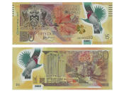 Die 50-Dollar-Note aus Trinidad und Tobago konnte sich im Jahr 2014 gegen die Konkurrenz durchsetzen. Schön an der Gestaltung sind die Hibiskusblüten und das Abbild des heimischen Schwarzkehlkardinals. (Bild-Copyright: International Bank Note Society (IBNS))