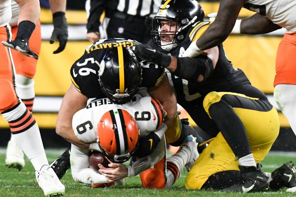 Steelers outside linebacker Alex Highsmith (56) sacks Browns quarterback Baker Mayfield (6) during the second half, Monday, Jan. 3, 2022, in Pittsburgh. (AP Photo/Gene J. Puskar)