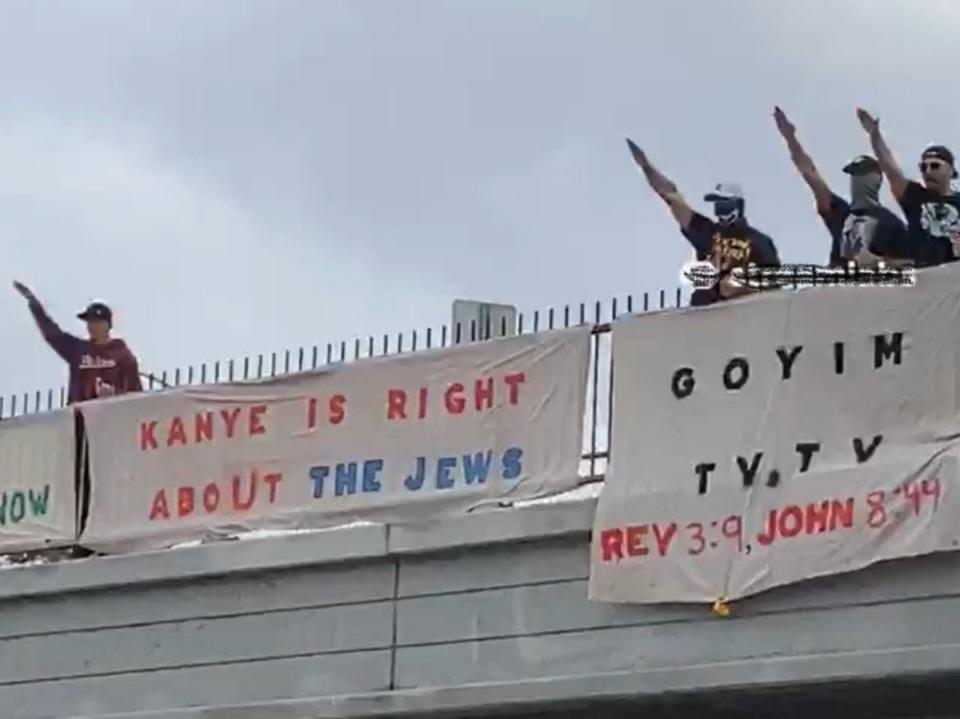 An antisemitic group unfurled a banner above a Los Angeles highway on 22 October supporting Kanye West’s antisemitic comments. (Anti-Defamation League)