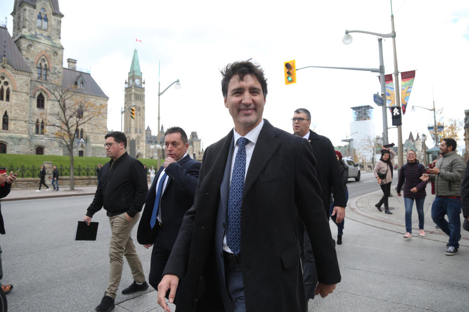 Canadian Prime Minister Justin Trudeau arrives for a news conference on October 23, 2019 in Ottawa, Canada. - A weakened Prime Minister Justin Trudeau set out October 22, 2019 to secure the support of smaller parties he will need to form a government after winning Canada's nail-biter general election but falling short of a majority. Trudeau's Liberals took 157 seats in the 338-member House of Commons, down from a comfortable majority of 184 in the last ballot (and from 177 at the dissolution of parliament), official results showed. (Photo by Dave Chan / AFP) (Photo by DAVE CHAN/AFP via Getty Images)