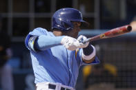 Tampa Bay Rays' Wander Franco, hits a home run in the second inning during a spring training baseball game against the Pittsburgh Pirates on Wednesday, March 3, 2021, in Port Charlotte, Fla. (AP Photo/Brynn Anderson)