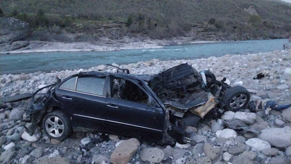 In this photo provided by the Albanian Police and released on Tuesday, April 2, 2024 a view of a damaged vehicle that crashed into the Vjosa River about 150 miles southeast of the capital, Tirana, Albania. Albanian police say a car crashed into a river in the country's southeast, killing all eight people on board, including seven suspected migrants and a local driver. The driver of the vehicle lost control and veered into the Vjosa River about 150 miles southeast of the capital, Tirana, around 4 a.m. on Tuesday, according to a police statement. (Albanian Police via AP)