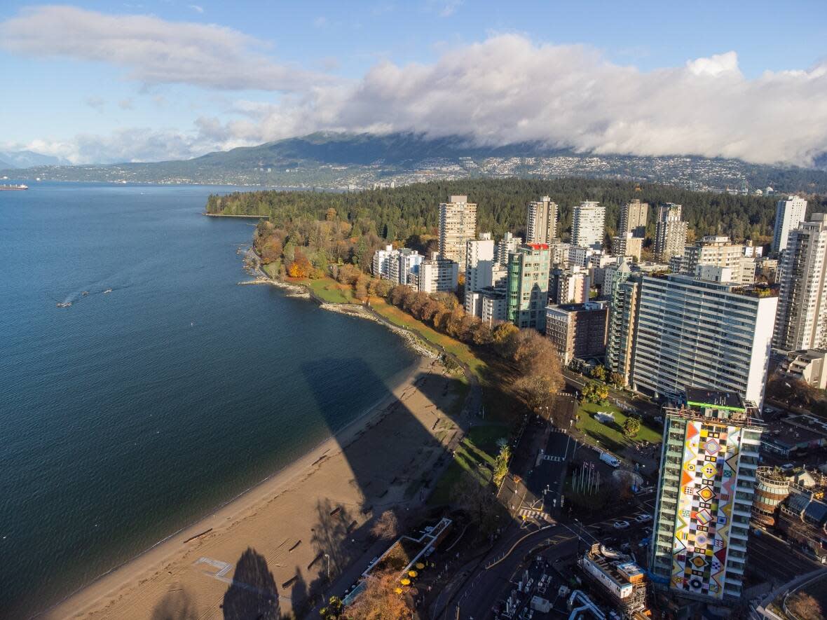 English Bay beach is pictured in Vancouver's West End. The owner of a bookstore and founder of a non-profit that helps fund literary events has also shared a list of books inspired by Vancouver, following comments that the city doesn't inspire great novels.  (Gian Paolo Mendoza/CBC - image credit)