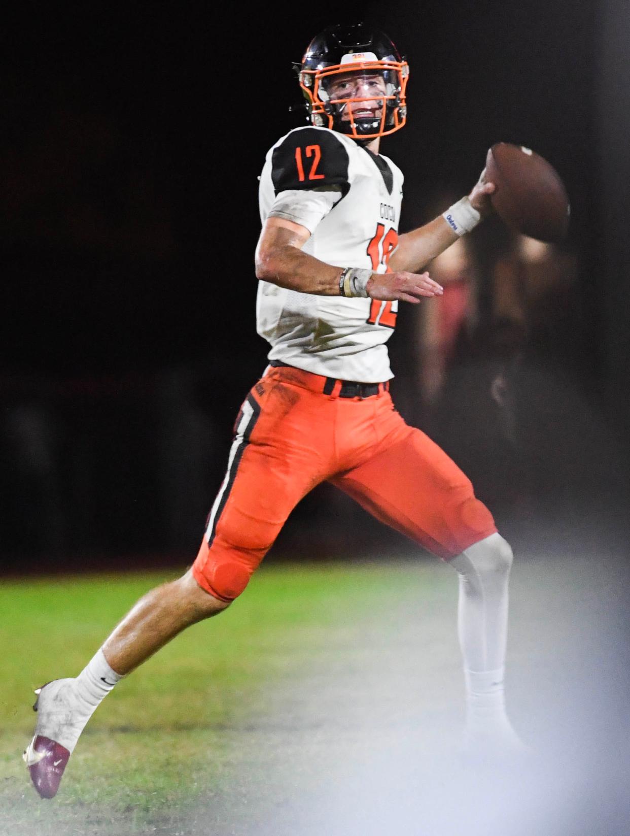 Blake Boda of Cocoa passes the ball over the South Sumter defense during the Class 2S regional final Friday, November 25, 2022. Craig Bailey/FLORIDA TODAY via USA TODAY NETWORK