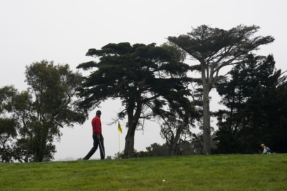 Tiger Woods walks to the 11th green during the final round of the PGA Championship golf tournament at TPC Harding Park Sunday, Aug. 9, 2020, in San Francisco. (AP Photo/Jeff Chiu)