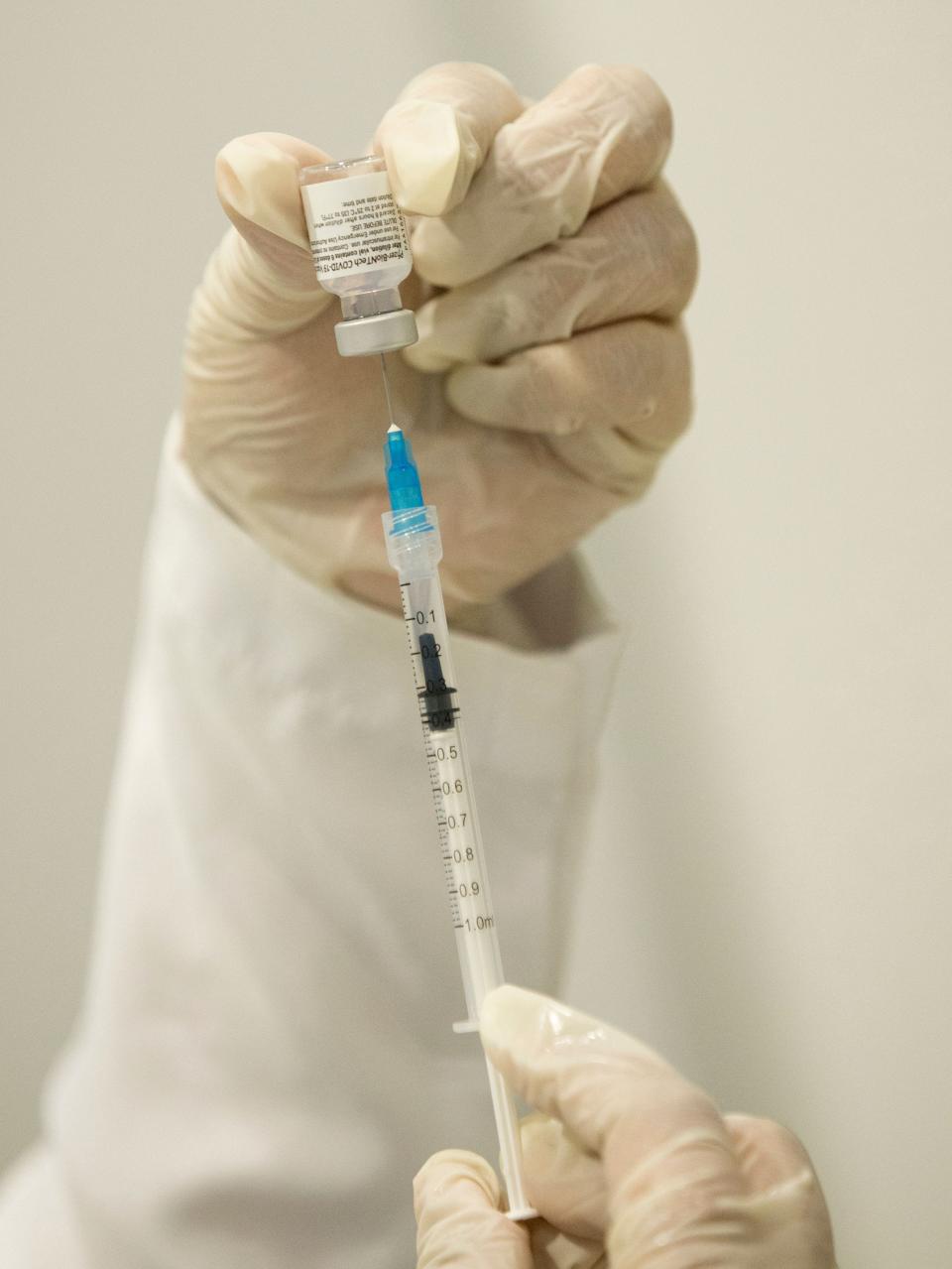 Preparing a COVID-19 vaccine in Muscat, Oman, on June 23, 2021.