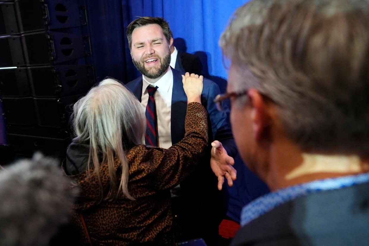 Nov 8, 2022; Columbus, Ohio, USA;  Supporters shake hands with J.D. Vance following his victory speech during an election night party for Republican candidates for statewide offices at the Renaissance Hotel in downtown Columbus. Mandatory Credit: Adam Cairns-The Columbus Dispatch