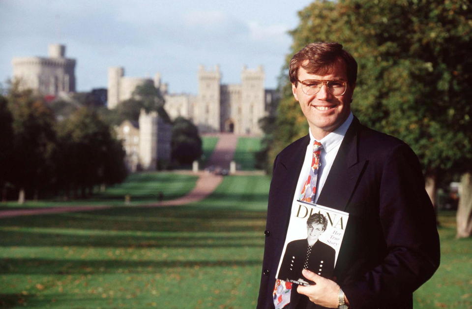 WINDSOR, UNITED KINGDOM - SEPTEMBER 01:  Author Andrew Morton In Front Of Windsor Castle Holding A Copy Of His Book On Diana (exact Day Date Not Certain)  (Photo by Tim Graham Photo Library via Getty Images)