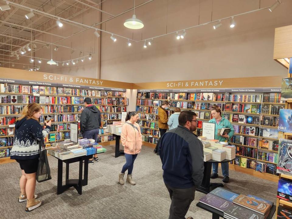 Customers browse the sci-fi section at the new Barnes & Noble at 6090 Garners Ferry Road in Columbia.