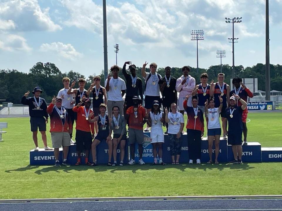 The Benjamin boys track and field team celebrates its second consecutive state championship at the University of North Florida in Jacksonville on May 18, 2023.