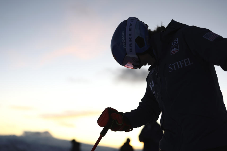 United States' Mikaela Shiffrin is silhouetted ahead of the first run of an alpine ski, women's World Cup giant slalom race, in Soelden, Austria, Saturday, Oct. 28, 2023. (AP Photo/Gabriele Facciotti)