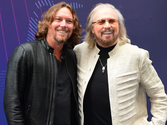 <p>Ian West/PA Images/Getty</p> Barry Gibb and his son Ashley Gibb attending the O2 Silver Clef Awards 2017 held at the Grosvenor House Hotel, London.