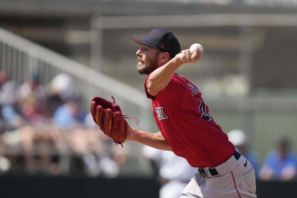 Boston Red Sox starting pitcher Chris Sale throws in the second inning of a spring training baseball game against the Minnesota Twins in Fort Myers, Fla., Saturday, March 11, 2023. (AP Photo/Gerald Herbert)