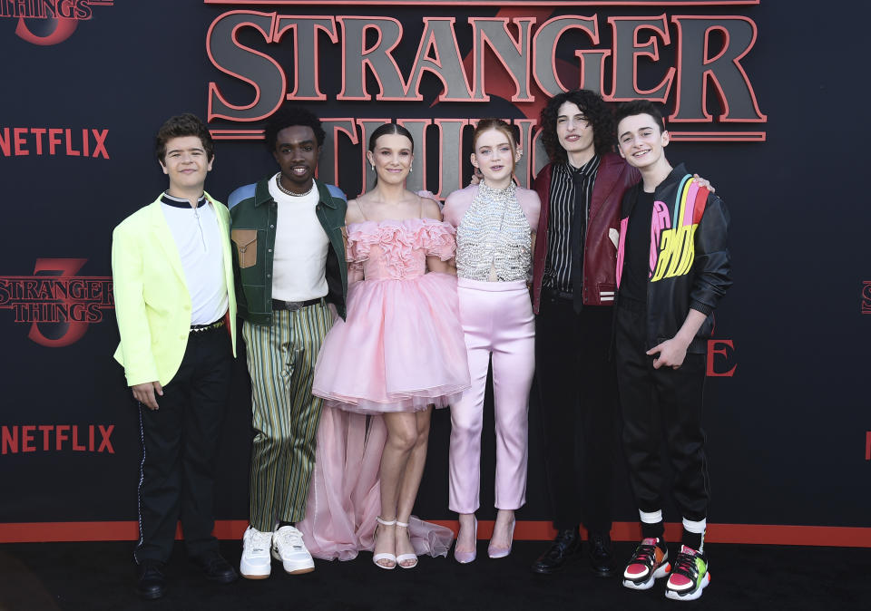 Gaten Matarazzo, Caleb McLaughlin, Millie Bobby Brown, Sadie Sink, Finn Wolfhard and Noah Schnapp arrive at the season three premiere of "Stranger Things" at Santa Monica High School on Friday, June 28, 2019, in Santa Monica, Calif. (Photo by Jordan Strauss/Invision/AP)