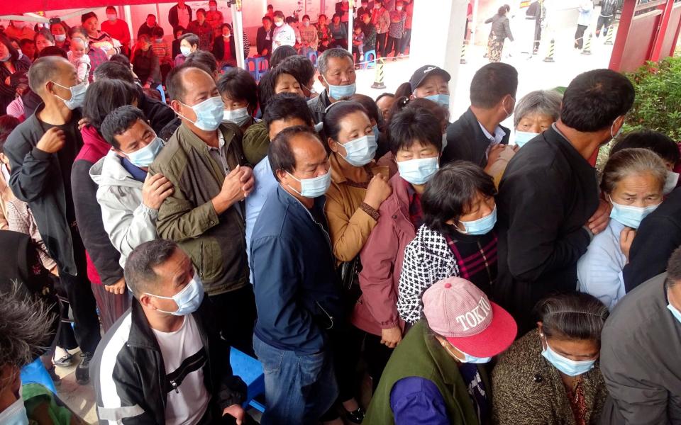 People queue for vaccinations in Anhui Province - Mark Schiefelbein /ChinaTopix