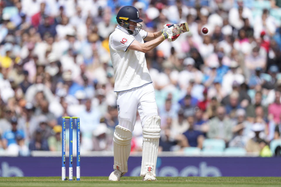 England's Zak Crawley plays a shot for four on day three of the fifth Ashes Test match between England and Australia, at The Oval cricket ground in London, Saturday, July 29, 2023. (AP Photo/Kirsty Wigglesworth)