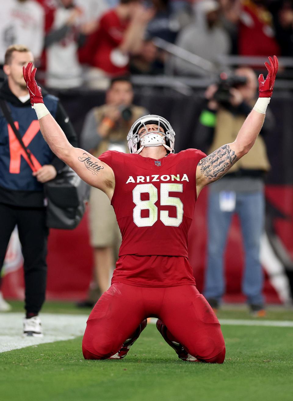Trey McBride #85 of the Arizona Cardinals celebrates a touchdown during the fourth quarter against the Seattle Seahawks at State Farm Stadium on Jan. 7, 2024, in Glendale.