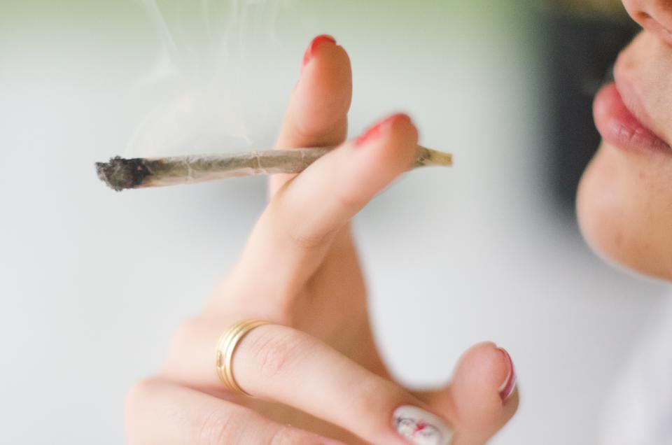 Close-Up Of Woman Smoking Weed (GETTY)