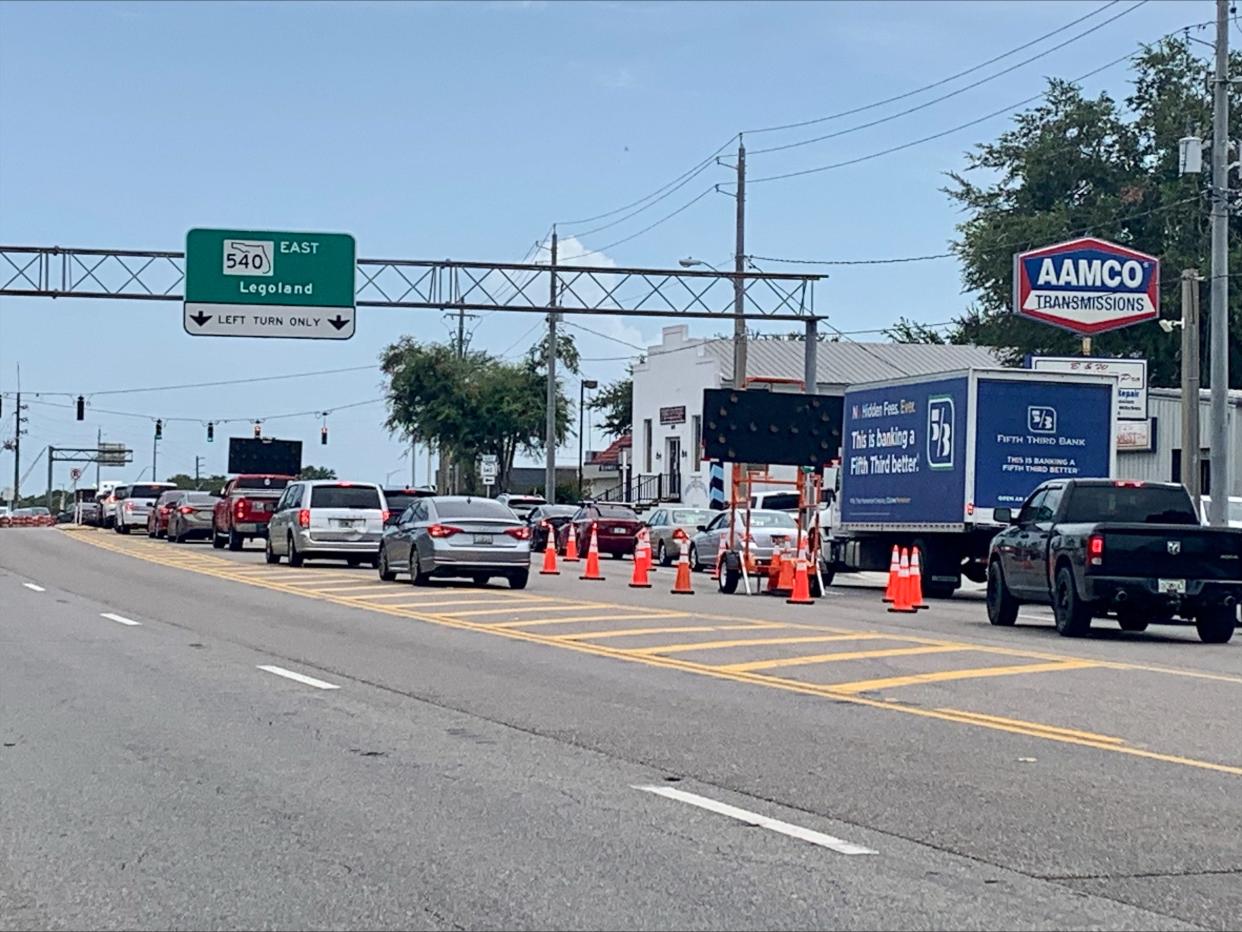Two lanes of US 17 at Cypress Gardens Boulevard were closed Tuesday after contractors noticed a depression in the roadway.