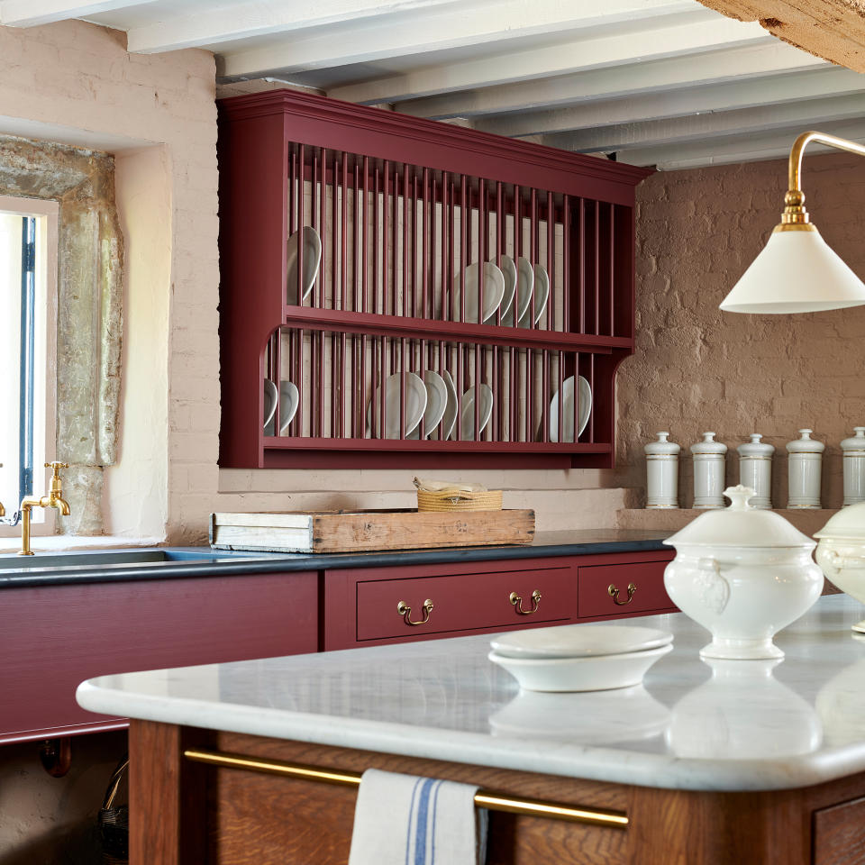 kitchen plate rack painted in a dark red