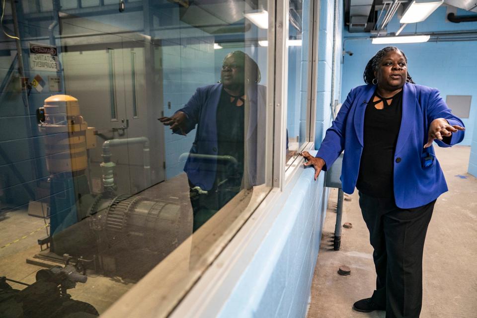 Cheryl Porter, chief operating officer for water and field services of the Great Lakes Water Authority shows the residuals processing area at GLWA's Water Works Park water treatment facility in Detroit, on April 24, 2023. This area removes solid particles from raw water brought from the Detroit River. It concentrates the particles are concentrated for removal and disposal, Porter said.