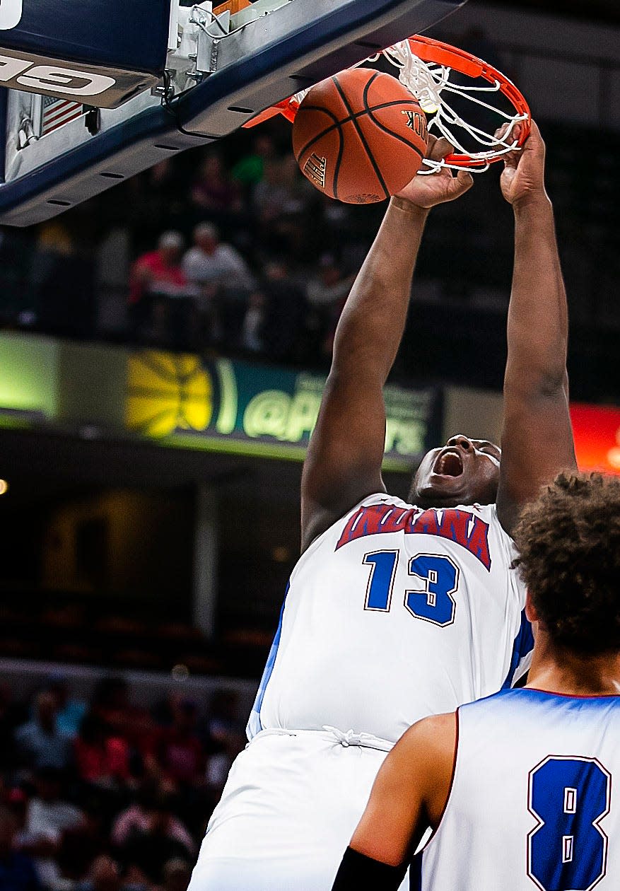 Ben Davis' Dawand Jones (13) dunks the ball during the Indiana All-Stars vs. Kentucky All-Stars game on June 8, 2019, in Indianapolis.