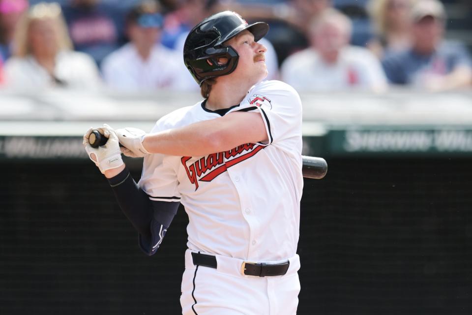 Cleveland Guardians designated hitter Kyle Manzardo (9) hits an RBI single against the Washington Nationals on June 1 in Cleveland.