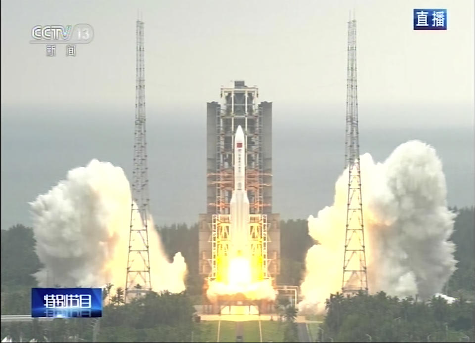 In this image taken from video footage run by China's CCTV via AP Video, a Long March 5B rocket carrying a module for a Chinese space station lifts off from the Wenchang Spacecraft Launch Site in Wenchang in southern China's Hainan Province, Thursday, April 29, 2021. China has launched the core module on Thursday for its first permanent space station that will host astronauts long-term. (CCTV via AP Video)