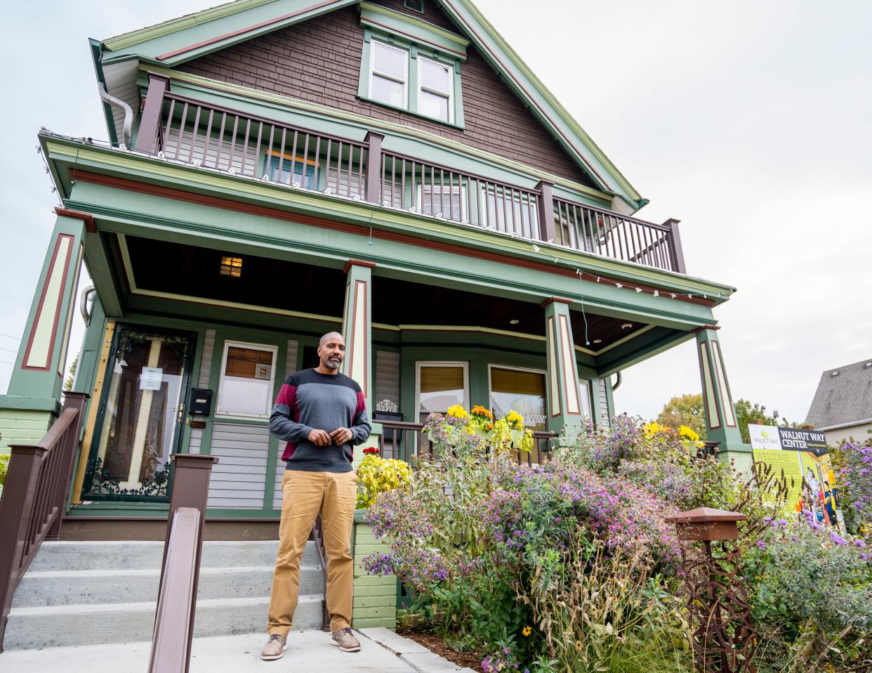 Executive Director Antonio Butts stands in front of the Walnut Way Conservation Corp. community center, the neighborhood organization that represents Lindsay Heights, which has taken the very rare step of becoming an intervenor in We Energies' proposed rate hike, introducing the voice of low-income utility customers and people of color.