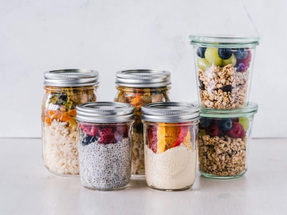 Jars of food stacked on a table